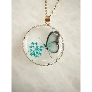Baby blue butterfly with blue flowers pendant necklace 